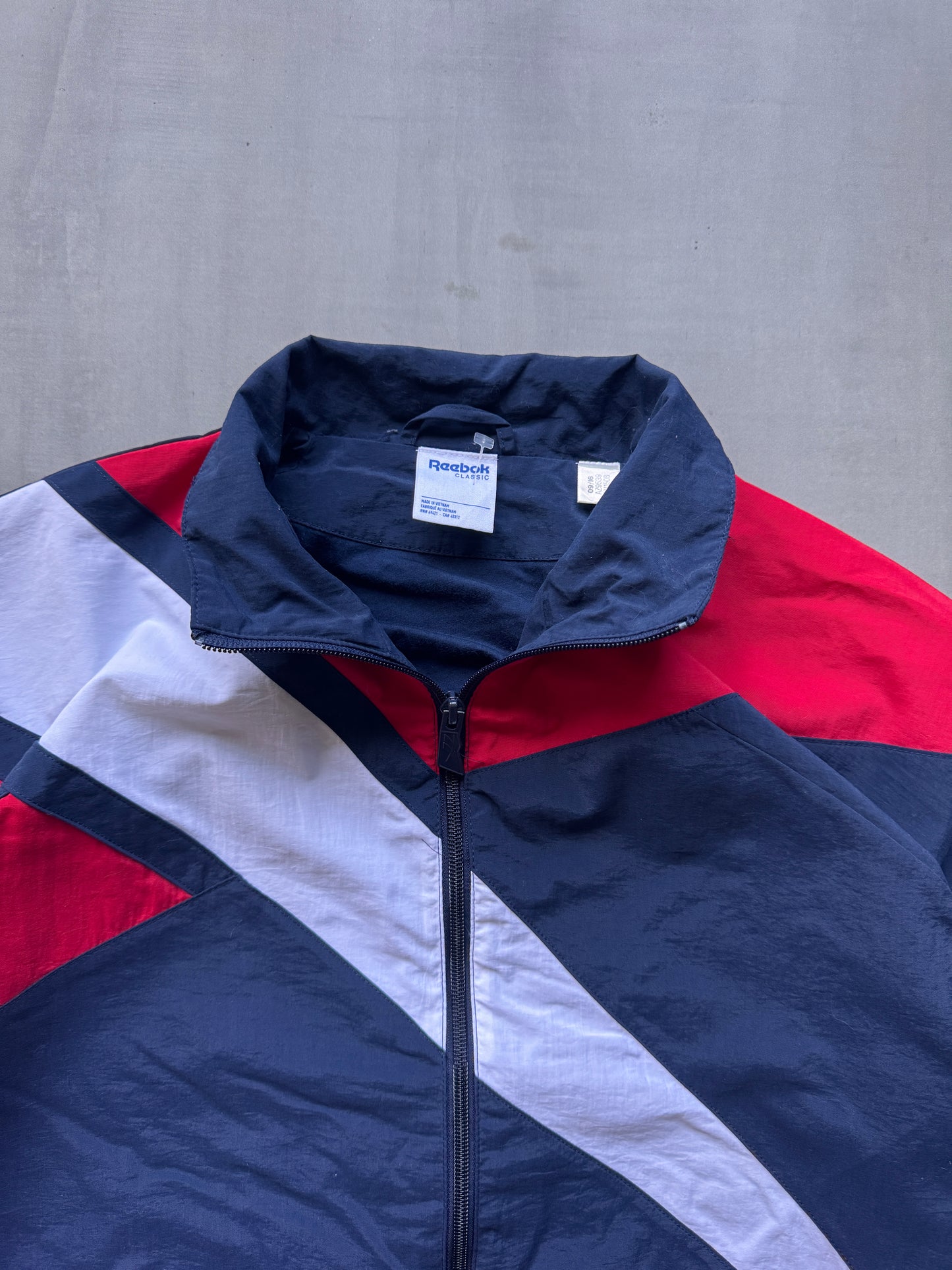 VINTAGE REEBOK MULTI COLOR TRACK JACKET - M
