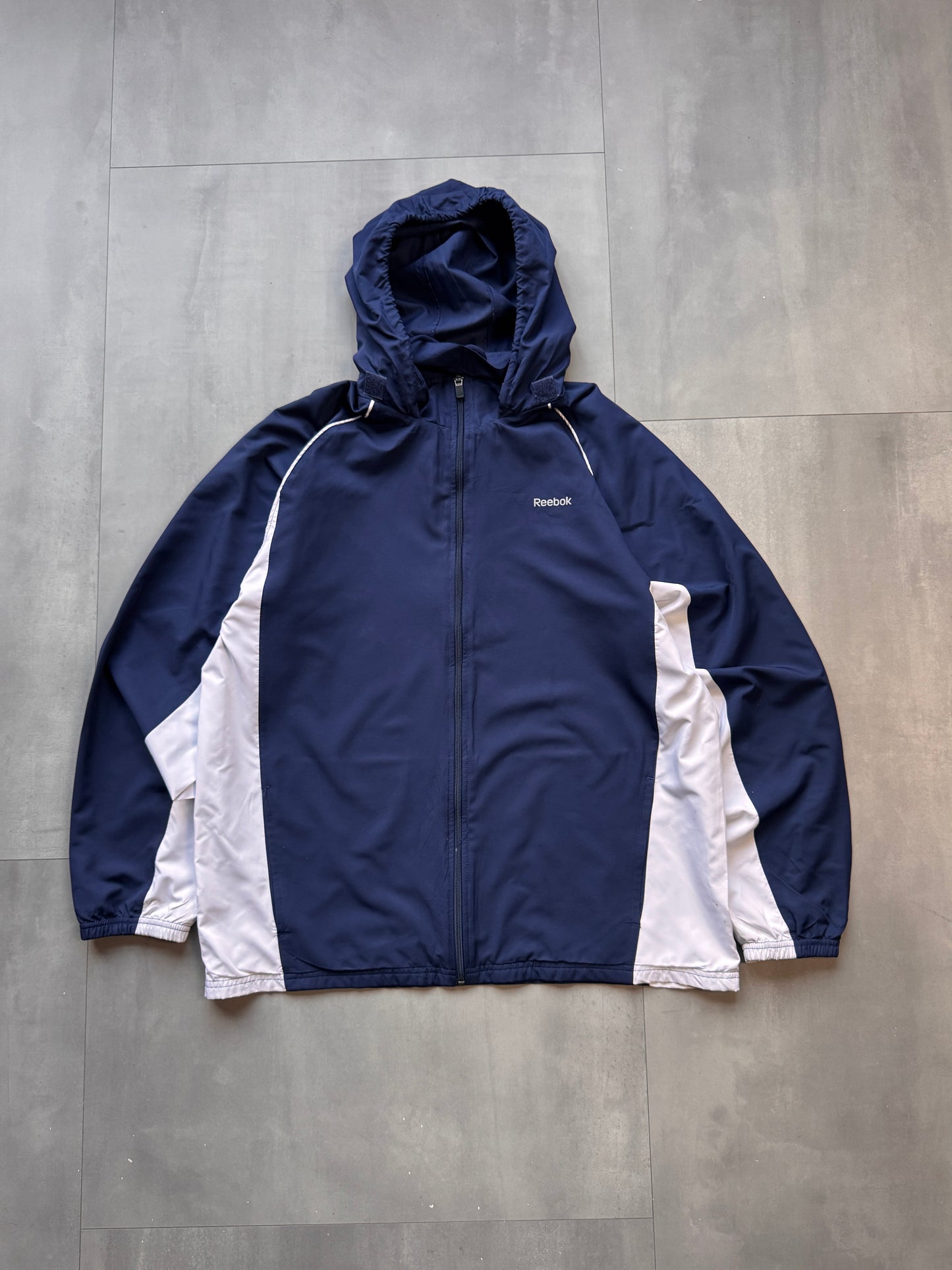 VINTAGE REEBOK NAVY HOODED TRACK JACKET - L