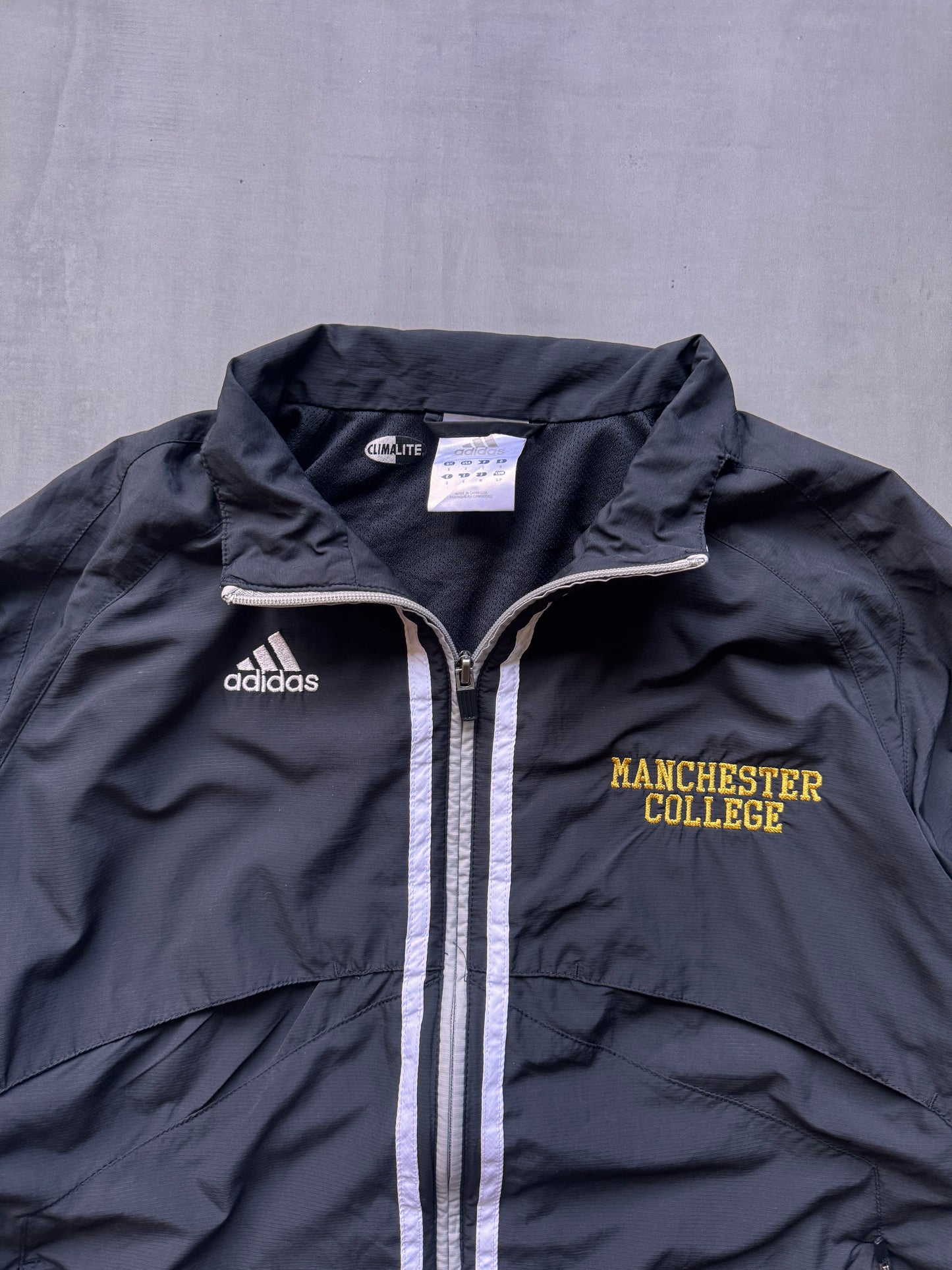 VINTAGE ADIDAS 'MANCHESTER COLLEGE' TRACK JACKET - M