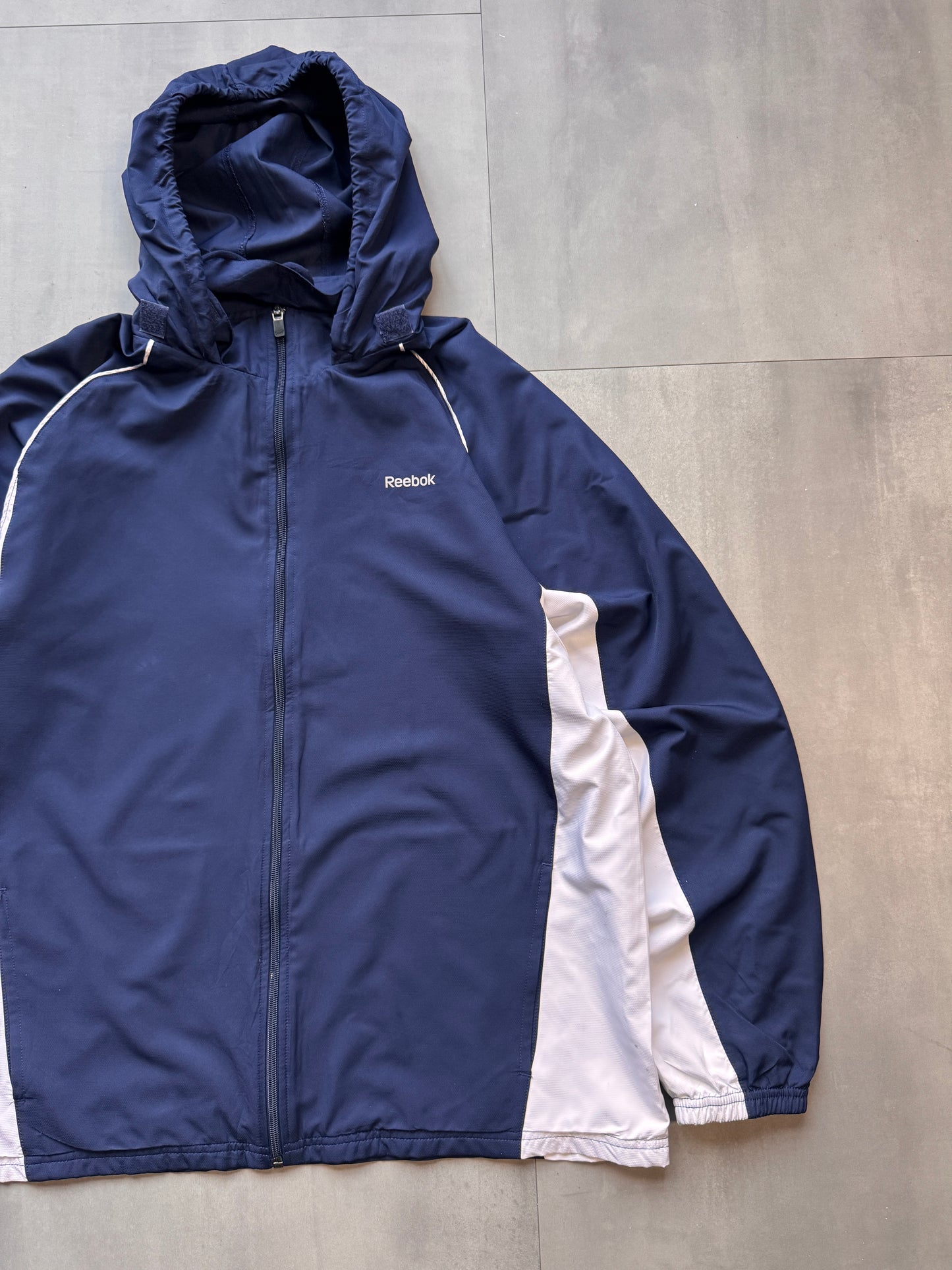 VINTAGE REEBOK NAVY HOODED TRACK JACKET - L