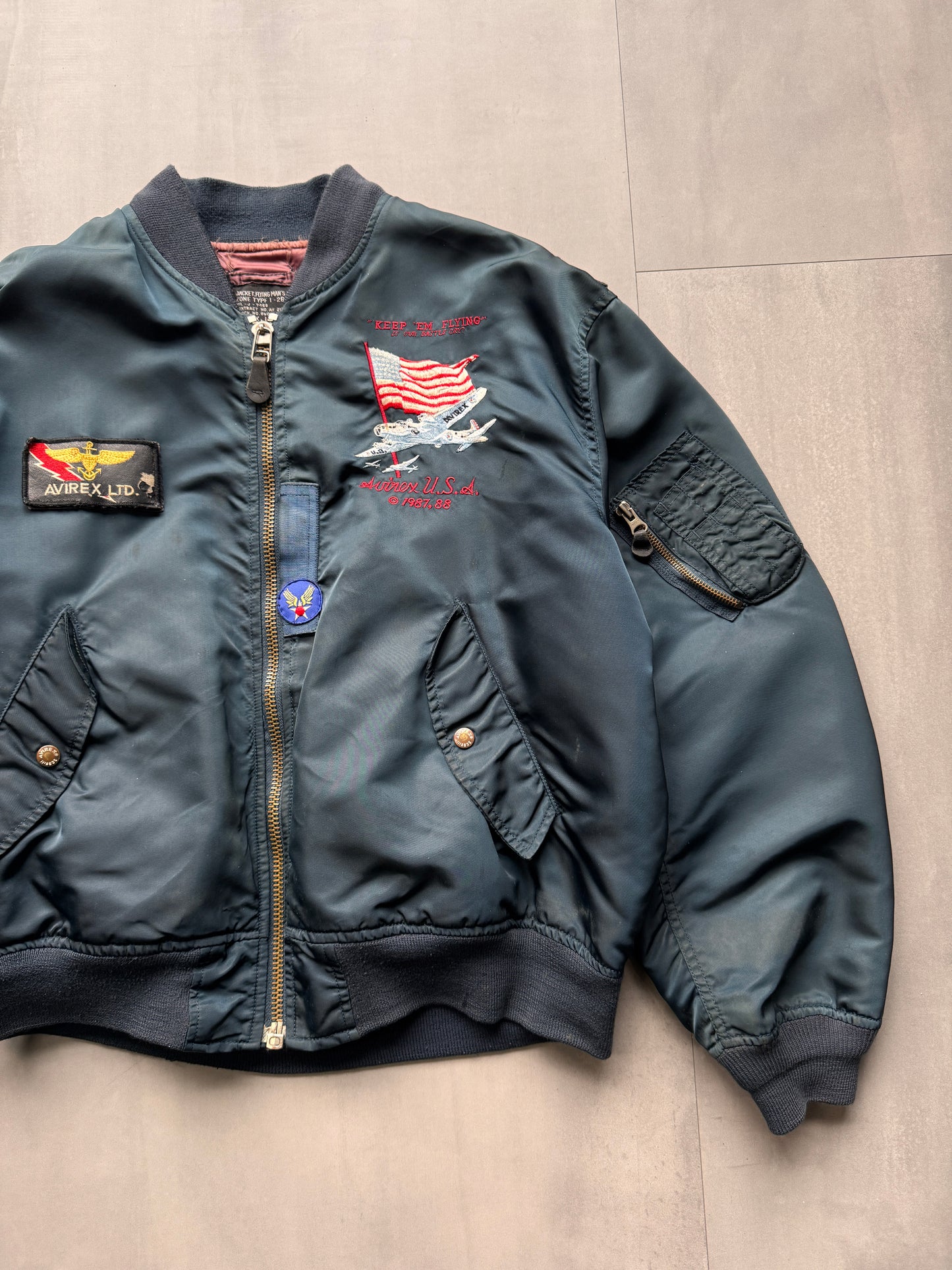 VINTAGE AVIREX LTD. NAVY M1 BOMBER JACKET - LARGE