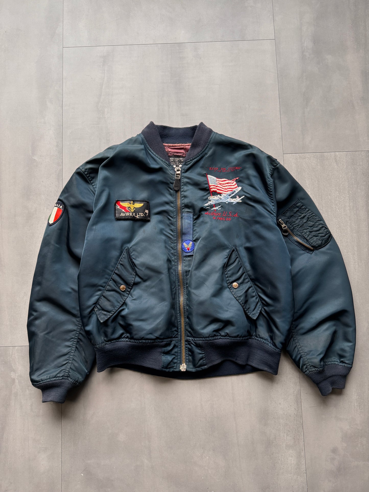VINTAGE AVIREX LTD. NAVY M1 BOMBER JACKET - LARGE