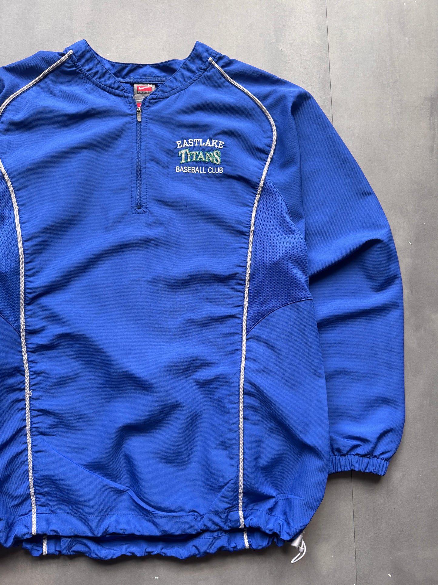 VINTAGE NIKE EASTLAKE TITANS BLUE WINDBREAKER - M